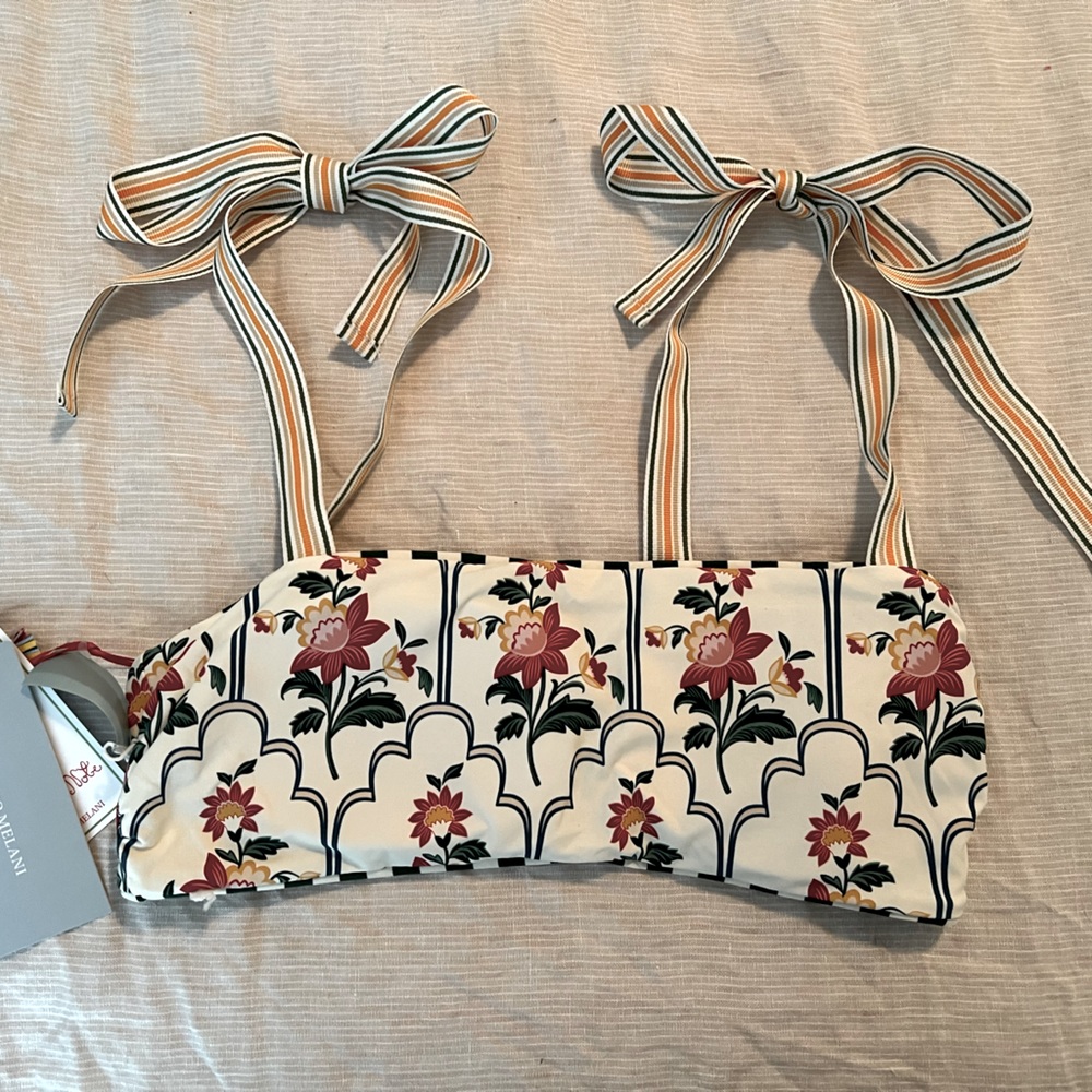This is an Antonio Melani reversible bikini top only with ribbon shoulder ties.